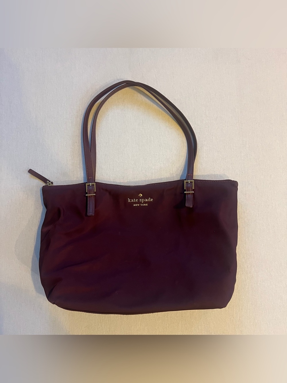 kate spade deep plum nylon tote with gold logo
